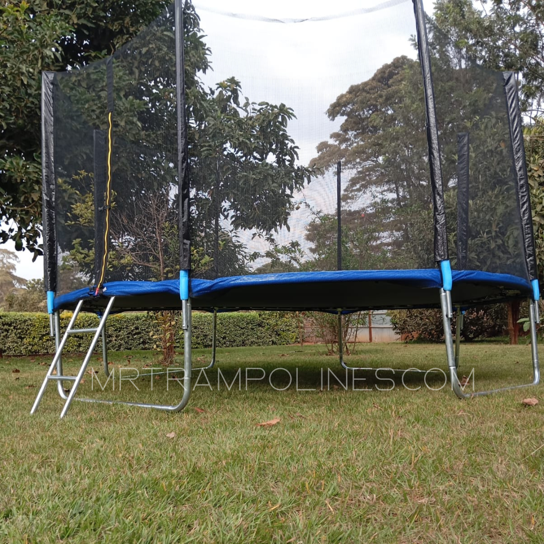 12ft outdoor trampoline installed in a gated estate Nairobi with safety enclosure net